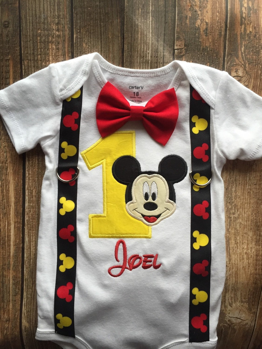 Custom boys first birthday Mickey Mouse bodysuit with suspenders and bow tie,